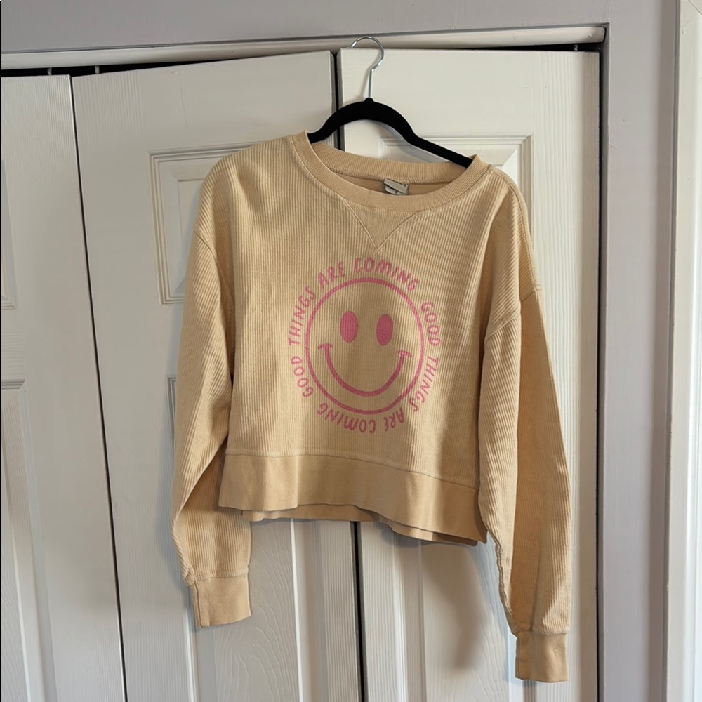 Beige Sweatshirt with Pink Smiley Face